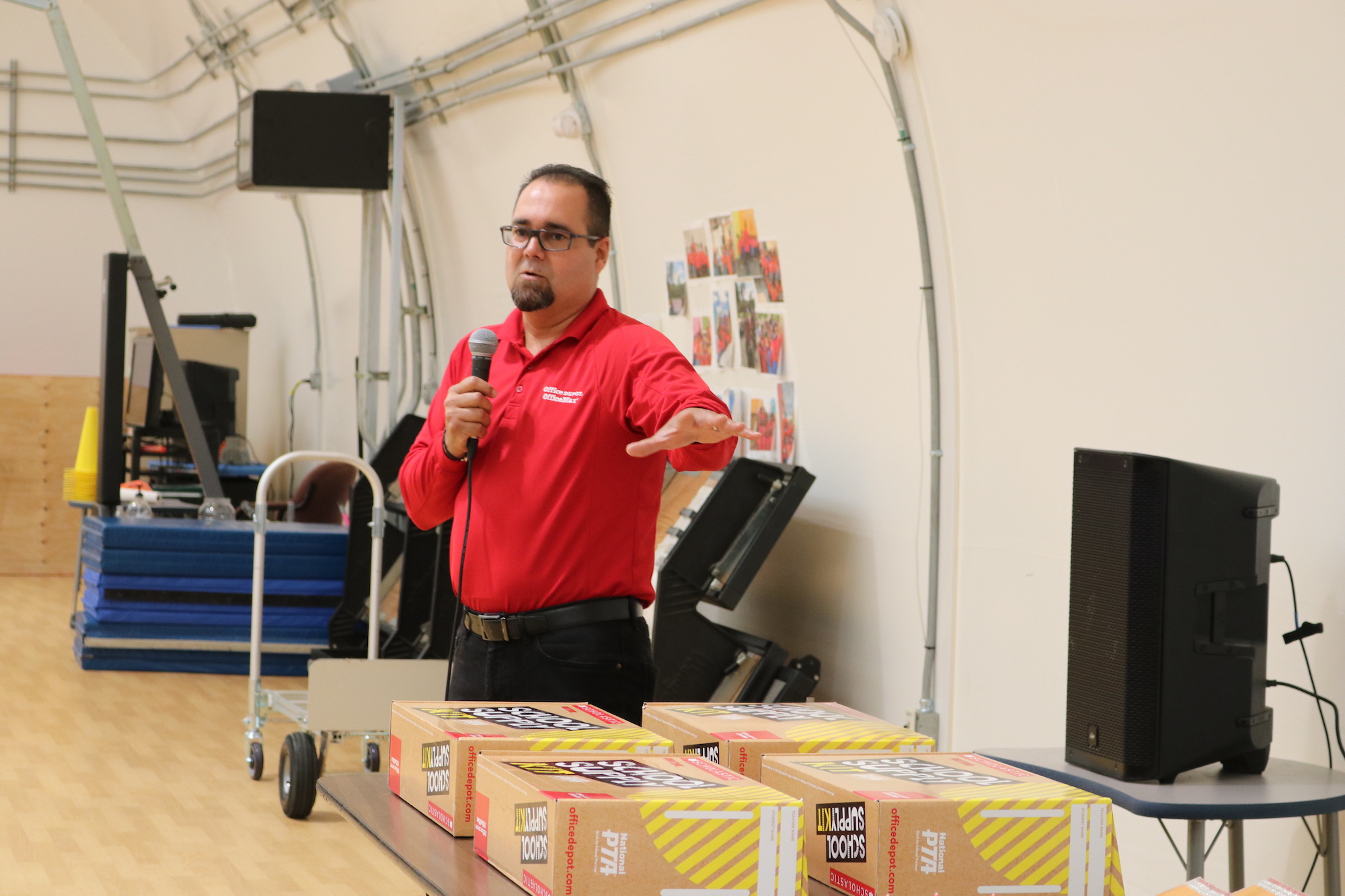 OD Manager Jorge Sanchez presents $4000 worth of school supplies.JPG